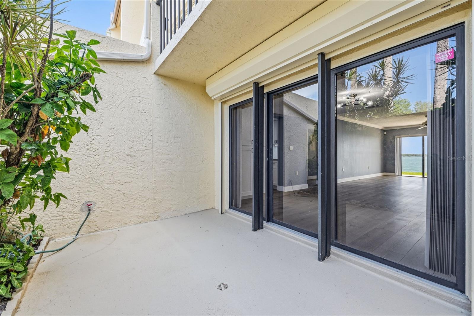Front Patio has entry sliders for viewing
