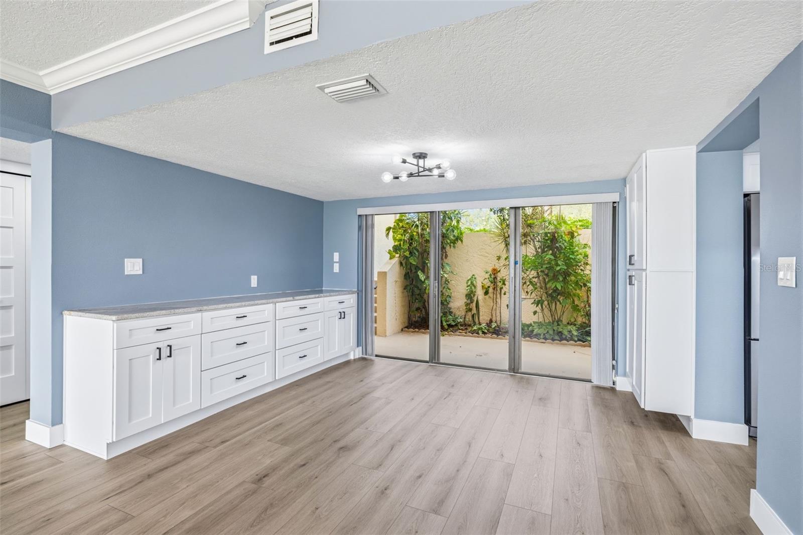 Open floor plan looking to back patio