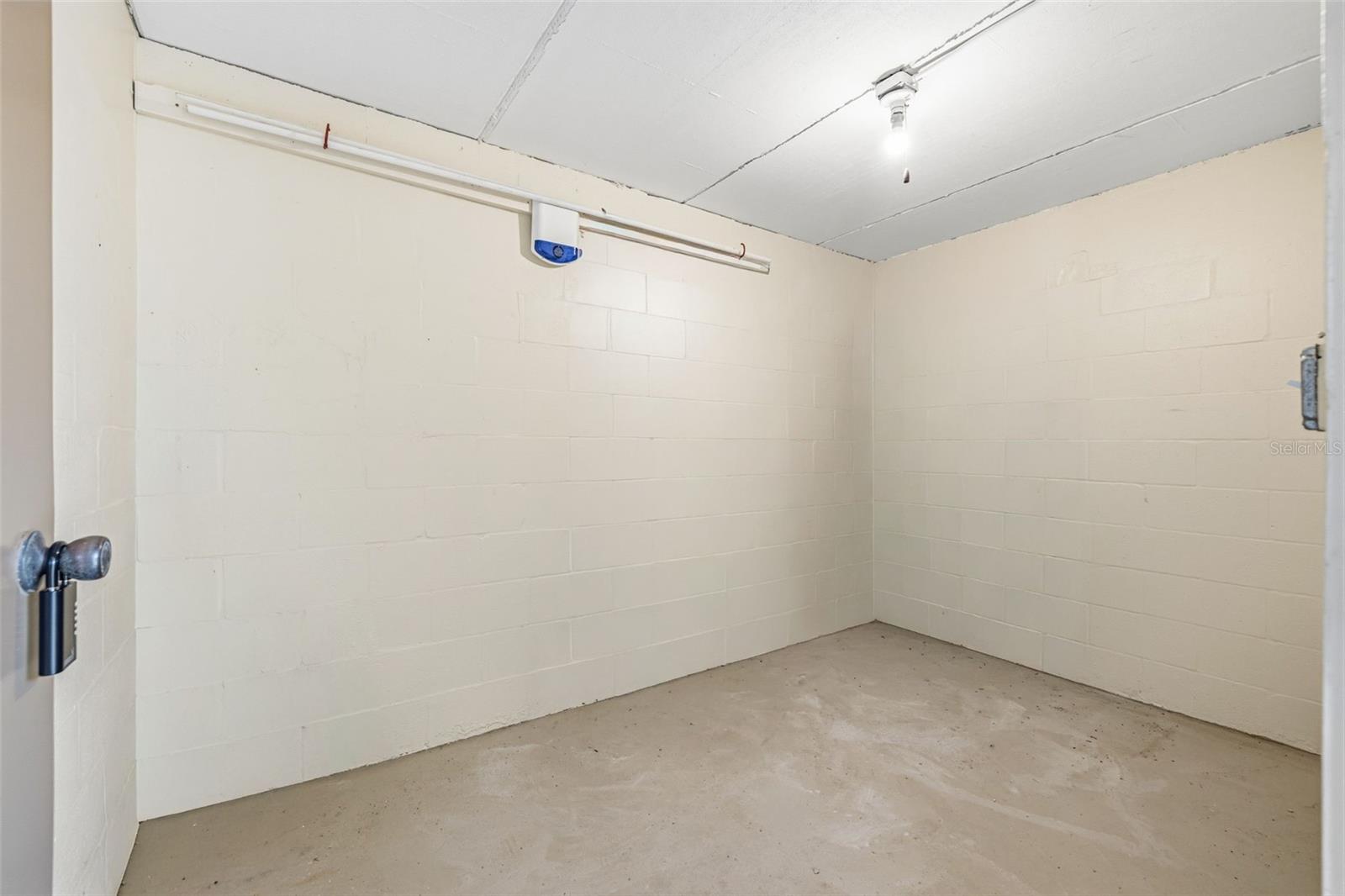 Storage unit. for T22 Located next to entry door off front patio