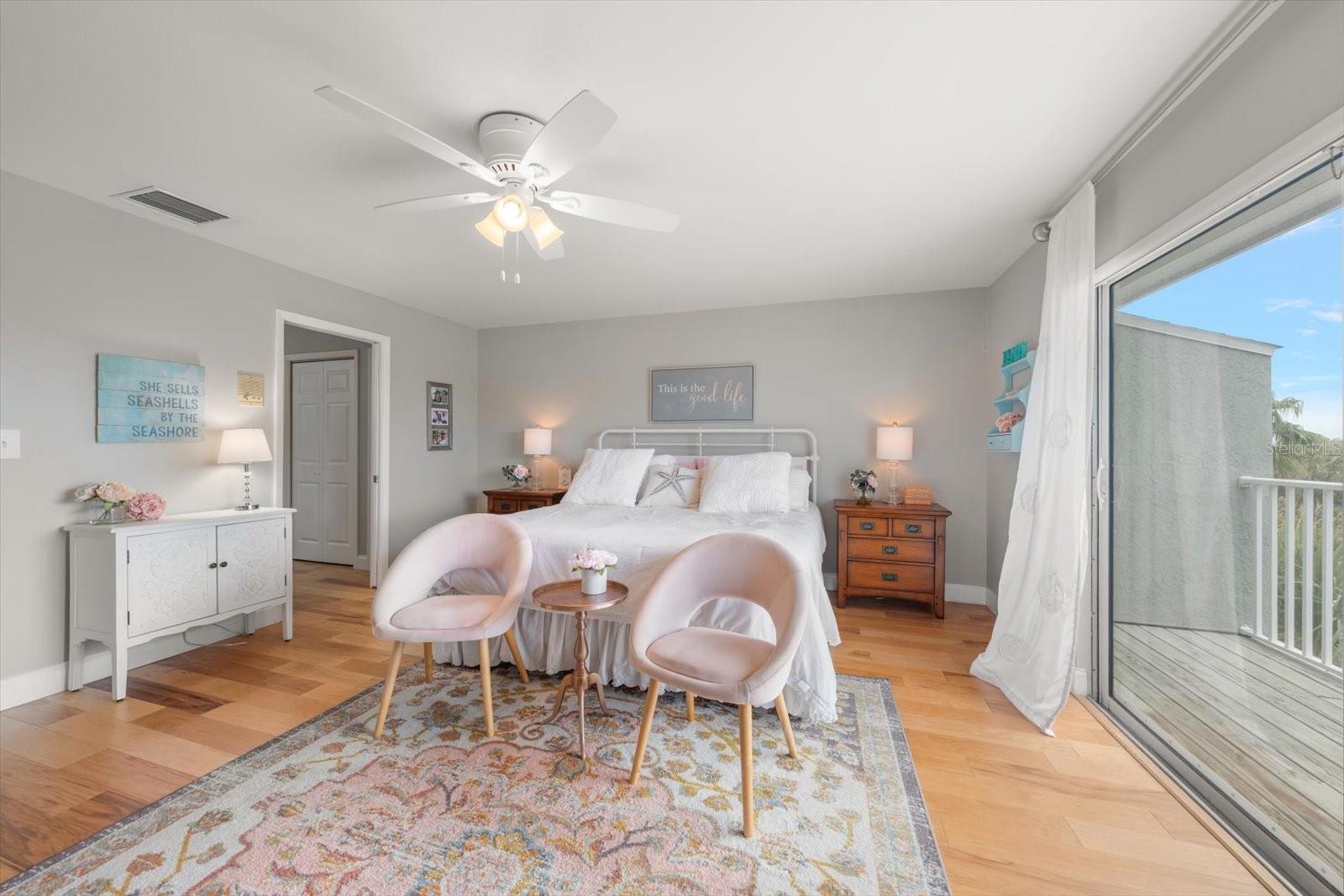 A private balcony from the primary suite completes this room.