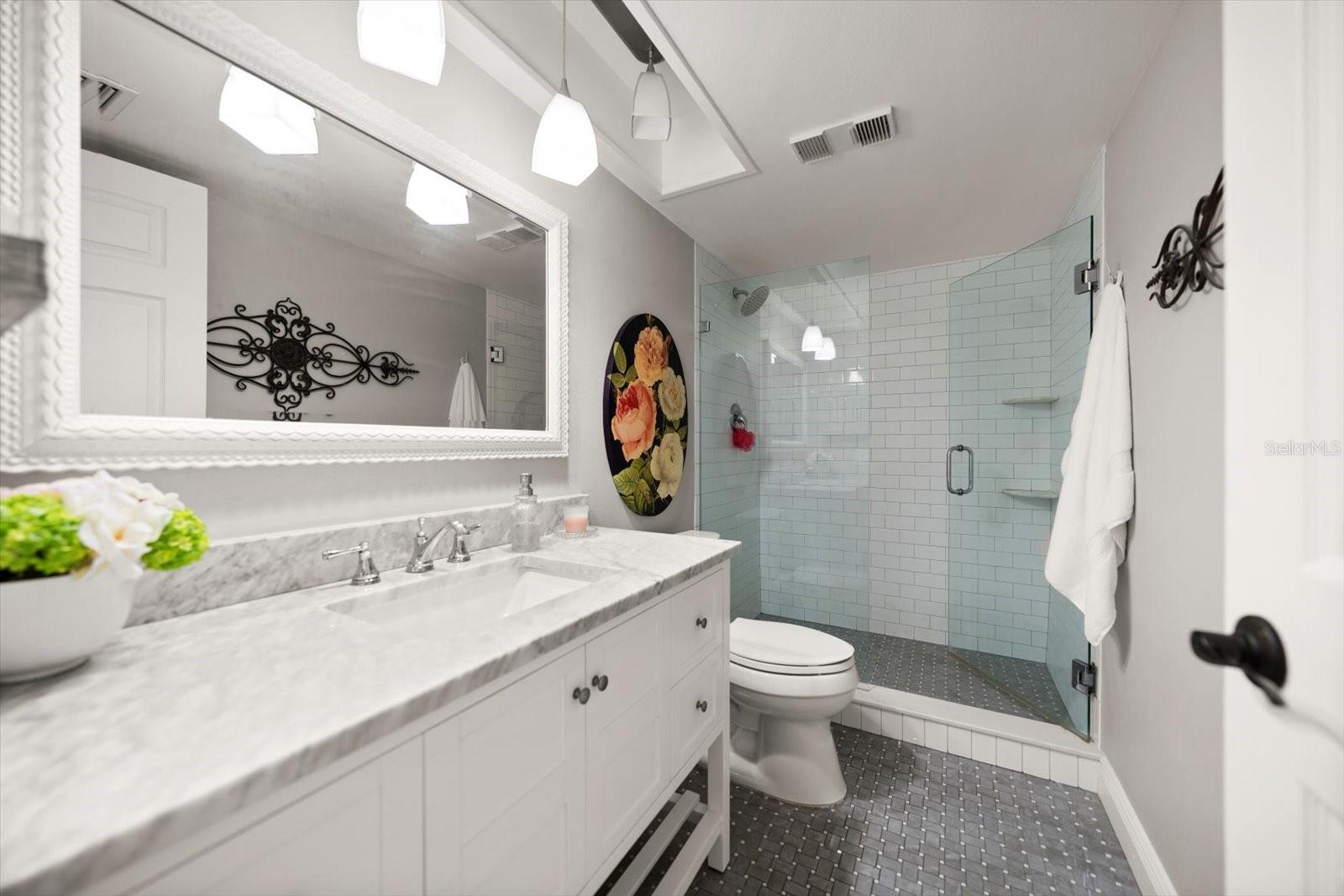 Refined touches are found throughout, especially in the refreshed guest bathroom!