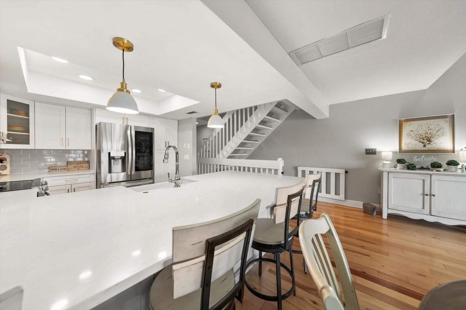 Attractive contemporary kitchen with oversized breakfast counter!