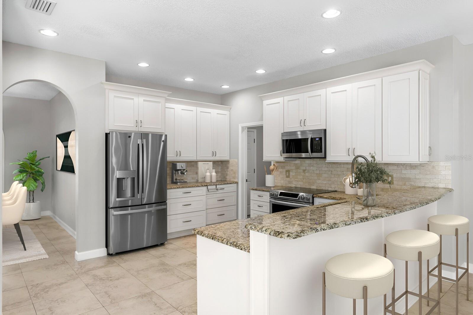 Upgraded Kitchen With Wood and Granite Cabs