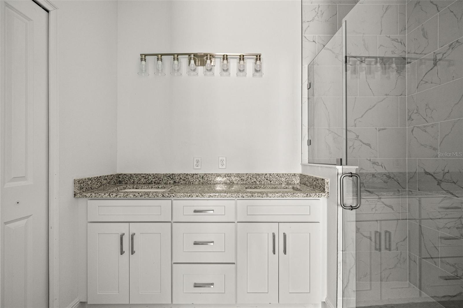 primary ensuite with double sink vanity