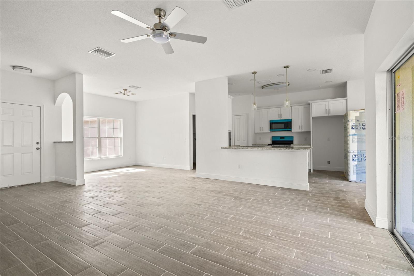 open concept living room/ kitchen