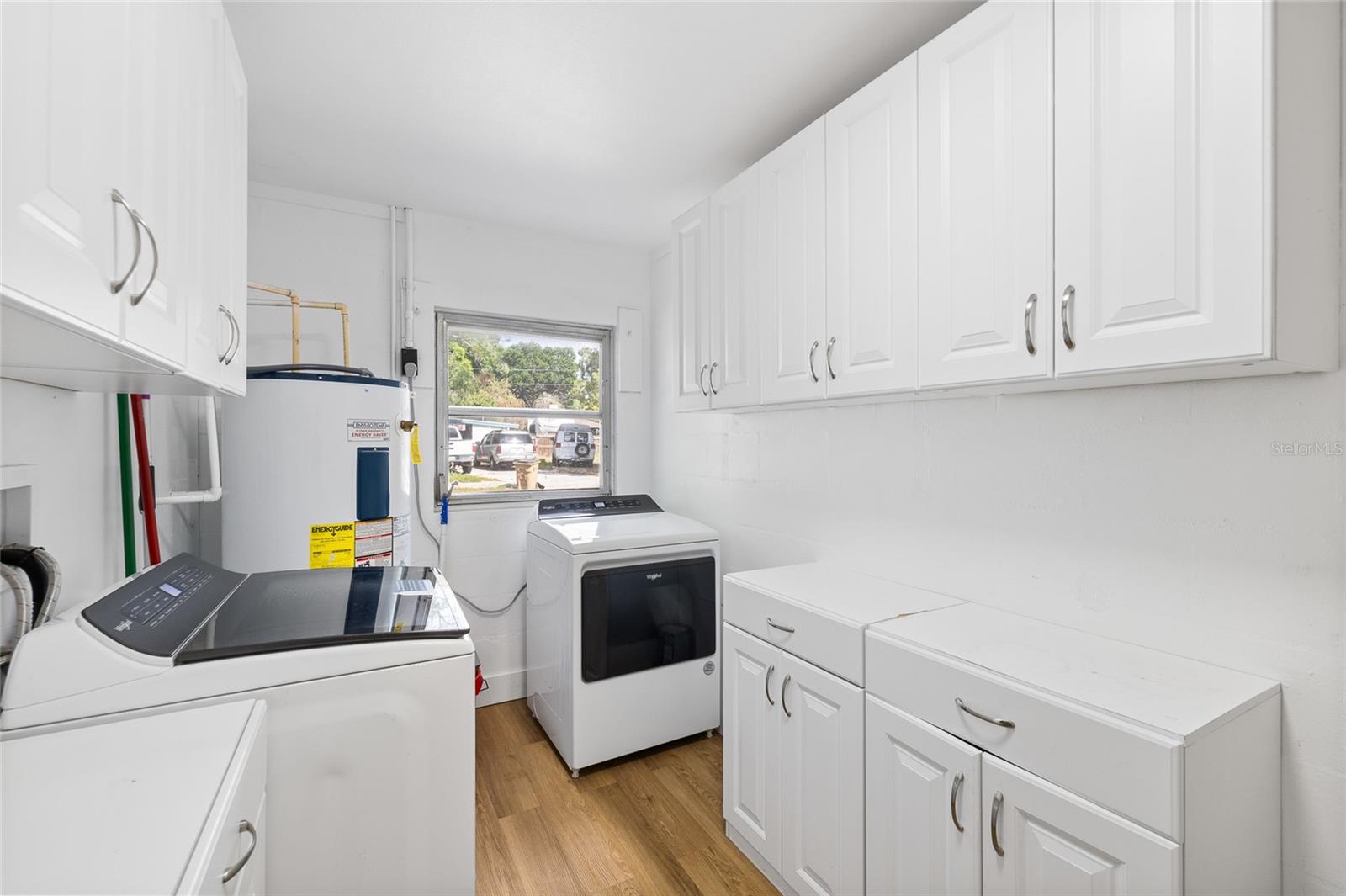 Interior Laundry Room + Extra Storage Room