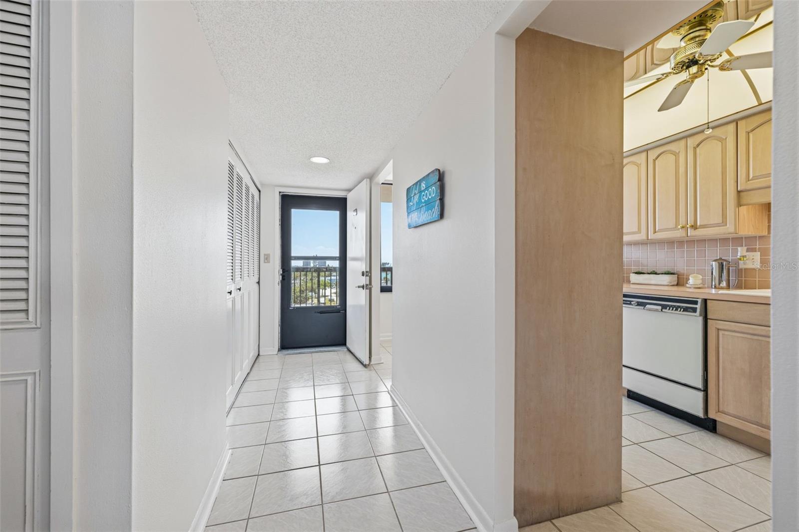 Entry hallway adjacent to kitchen