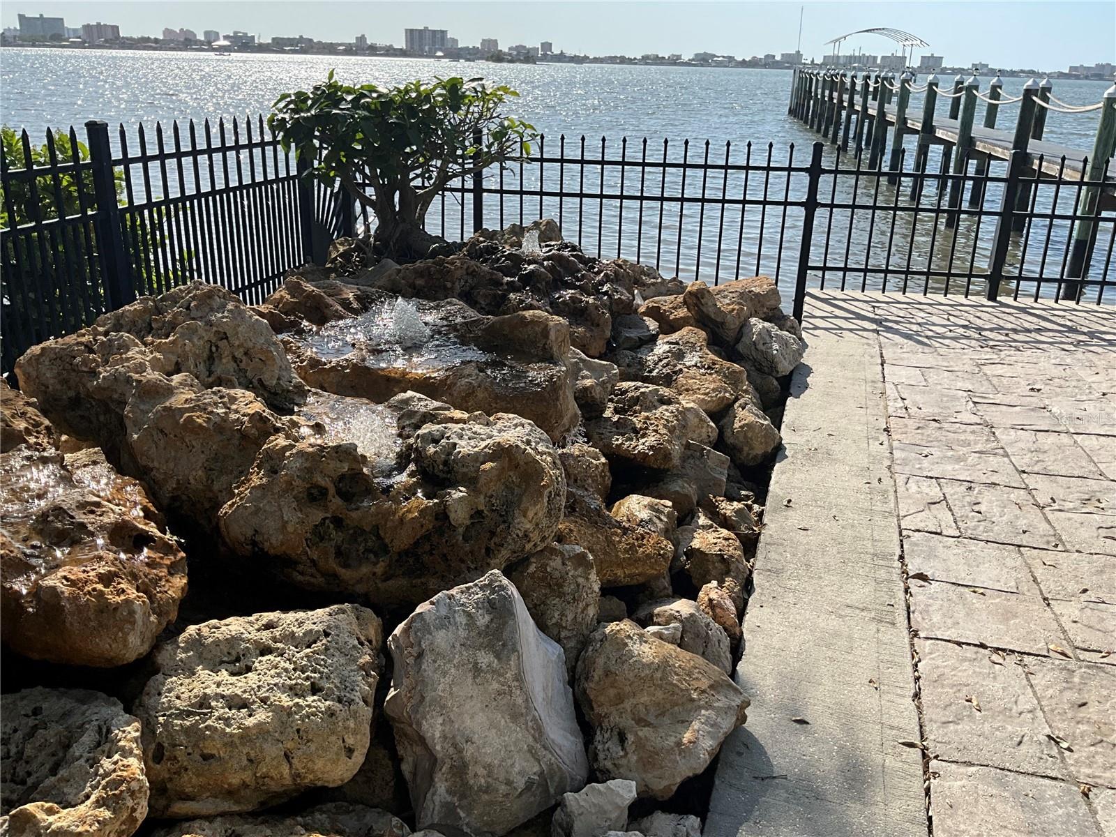 Water fountain for that peaceful sound of flowing water as you relax on the stone patio at waters edge
