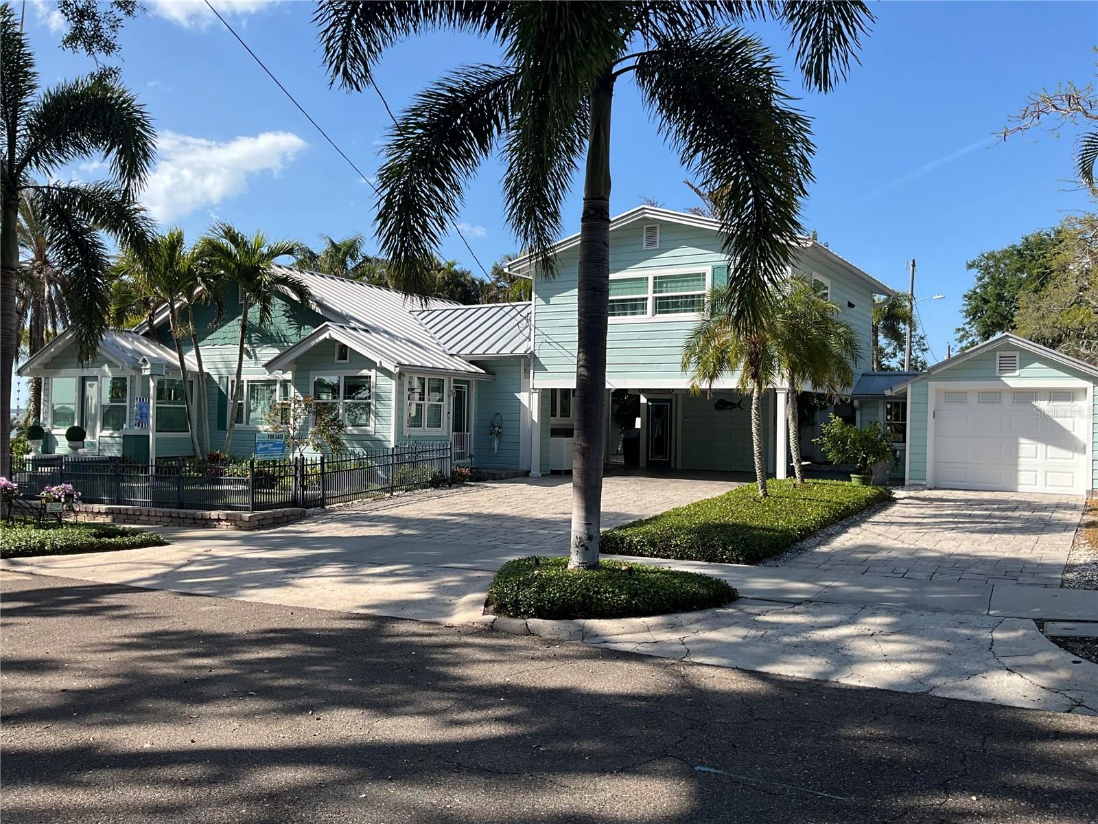 The secondary housing over the carport and the detached garage.