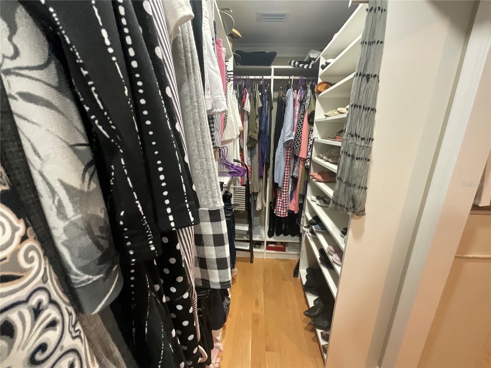 Closet with lots of shoe organization too