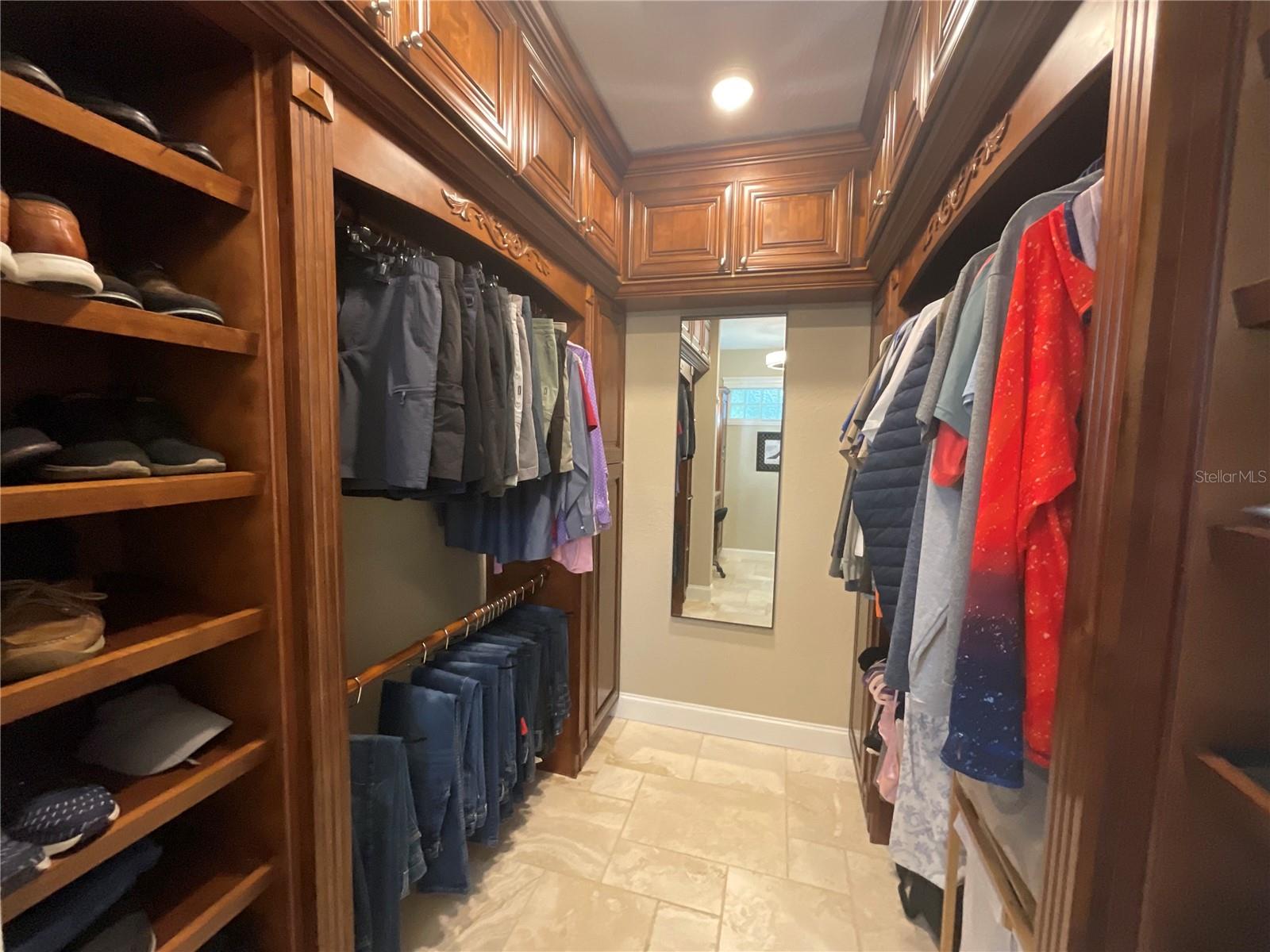 Custom cabinet walk in closet in the Primary