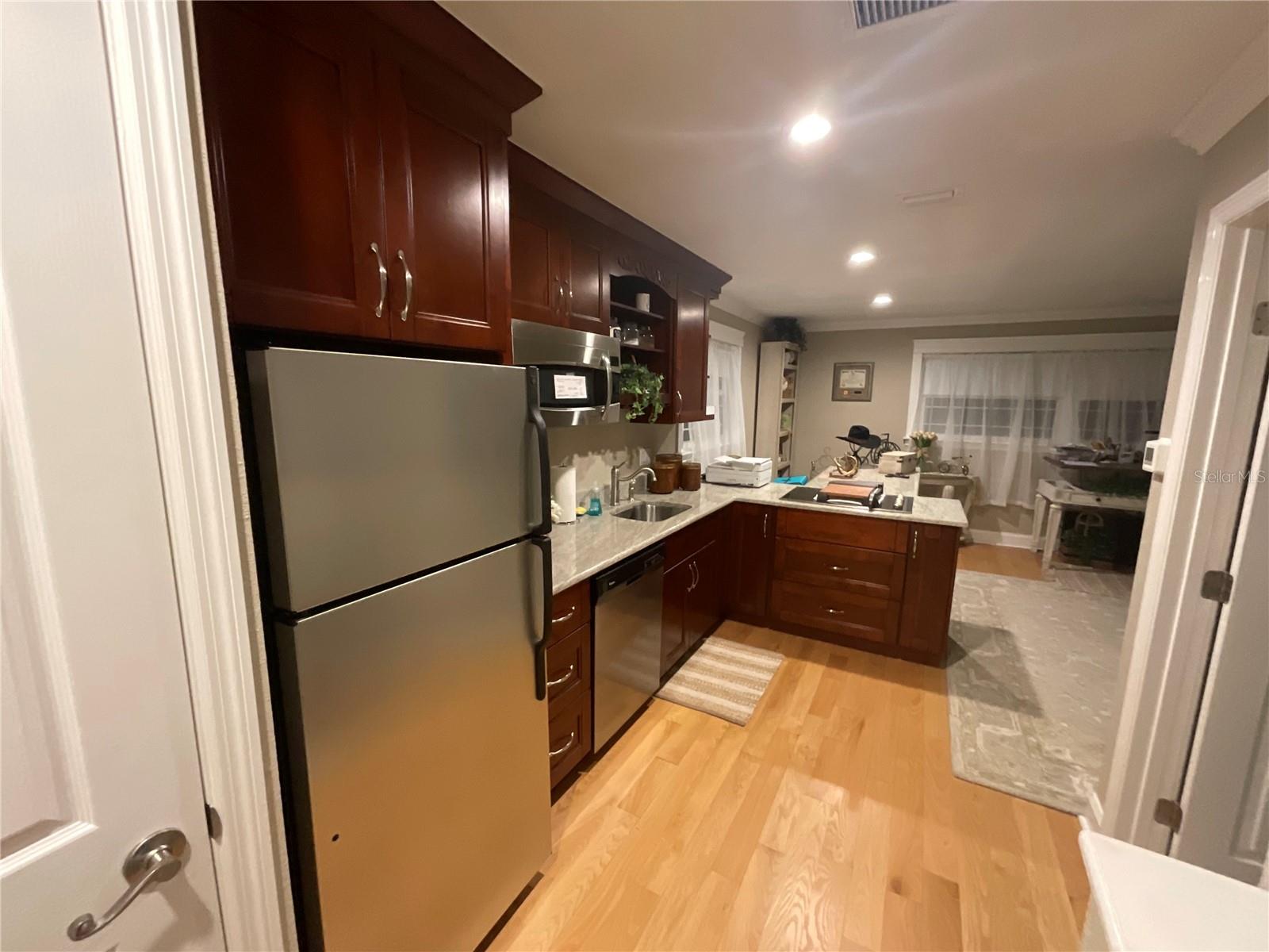 The kitchen is first view W/D closet / frig / sink / Convection-microwave / range top