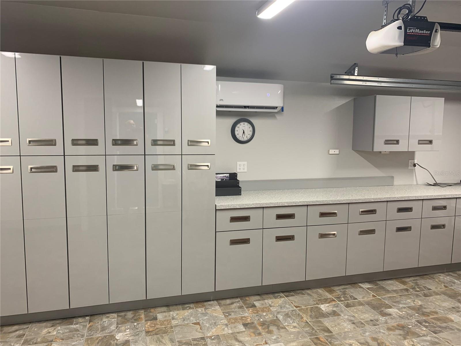 Garage - organized cabinetry.
