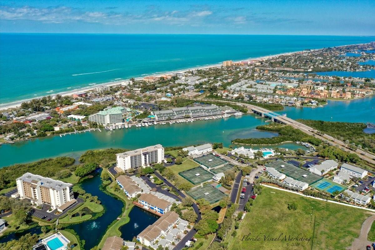 ... High Aerial of Shipwatch &  Bridge to Indian Rocks Beach. With Land Prices so High - There will never be another Shipwatch Built.  There are only 3 Resort Like Complexes along the 22 Miles of Beaches. Sand Pearl in Clearwater Bch - Shipwatch Off Indian Rocks Beach and The Treasure Island Yacht & Tennia Club. Enjoy...