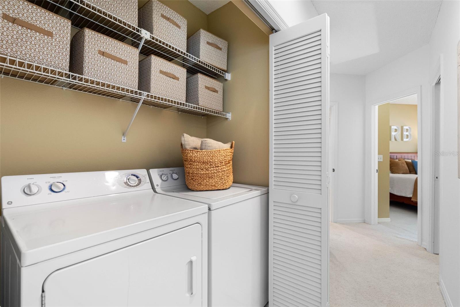 .. Laundry Closet by with Side By Side Washer & Dryer By Guest Bedrooms & Hallway Bathroom..