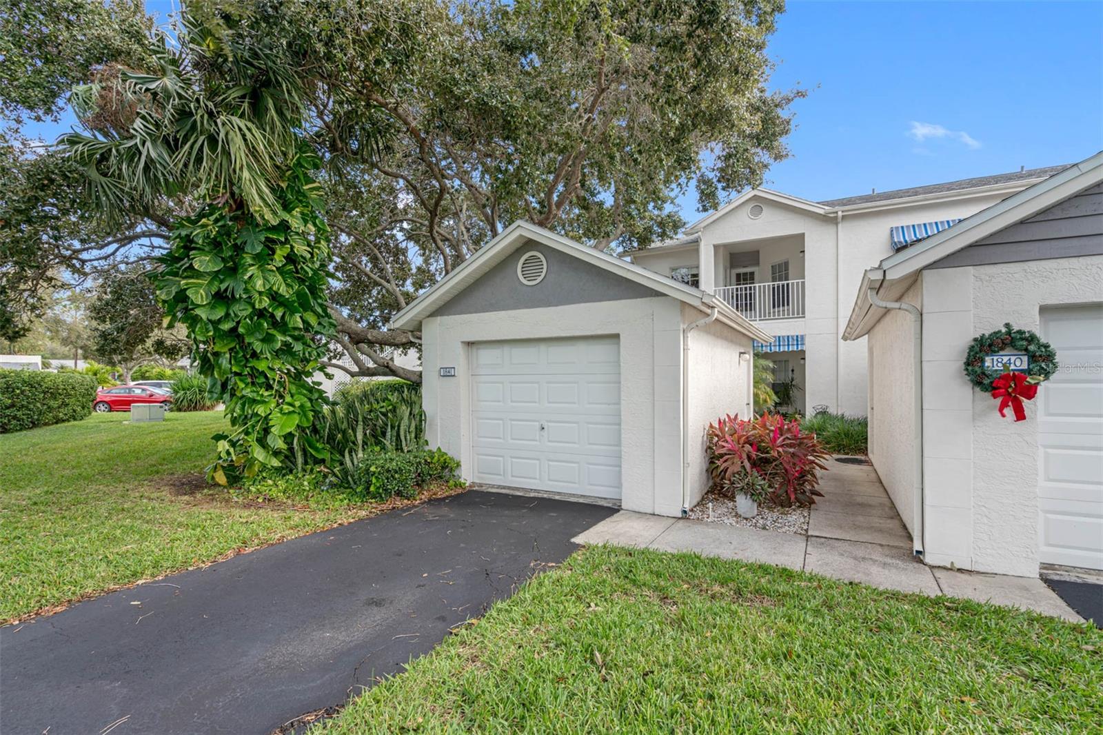 .. Shipwatch Villas Convey with  Private Garages..  2nd Floor Villas Enjoy 10 Ft Ceiling Heights in Living Aeras & an Exterior Front Porch Sitting Area. Located at 11351 Shipwatch Lane Unit # 1841 .... Enter Shipwatch - Drive to Dead End.. Make Left at Shipwatch Lane - 4th Building to #1841...