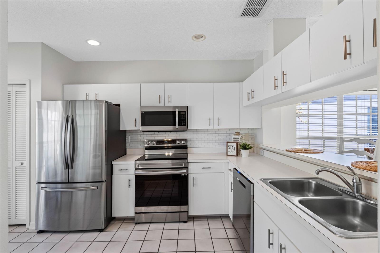 ...Kit #2..New Appliances - New Paint- Oodles of Cabinet Space..