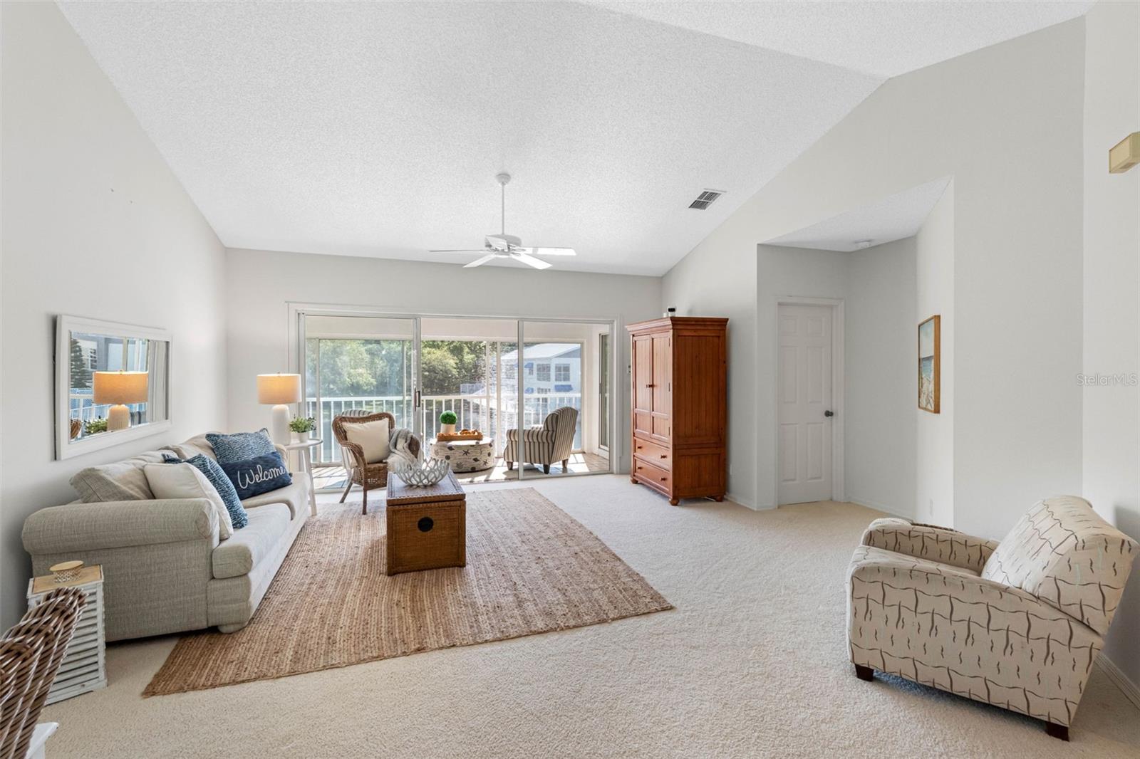 .. Living Room Area runs about 16.3 X 16.10.. Beautiful Ceiling Lines Accentuate the Condo. Master Bedroom Suite Thru Closed 6 Panel White Door.