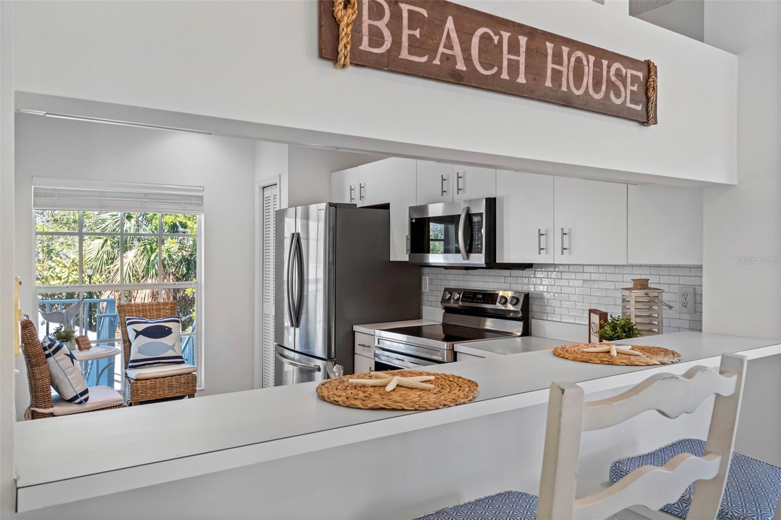 ..... WHITE COASTAL CABINETS - Beautiful Kitchen with NEW Appliances!.. .. 3 Bedroom - 2 Bath - 1445 Sq FT ... Entrance Off 10 x 14 Kitchen and Dining Area.. 2nd Floor  For Privacy & High Ceilings..