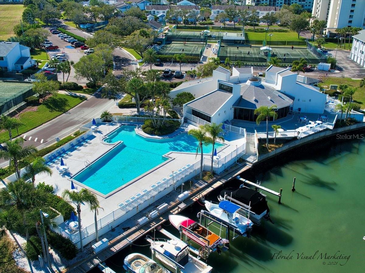 .. Aerial of Olympic Pool - Main Clubhouse with Restaurant Facilities for Inhouse Use & 32 Slip Boat Marina. Slips Can Handle a 28 to 30 Foot Craft.. It usually take me 6 months to locate a Slip for My Customers.
