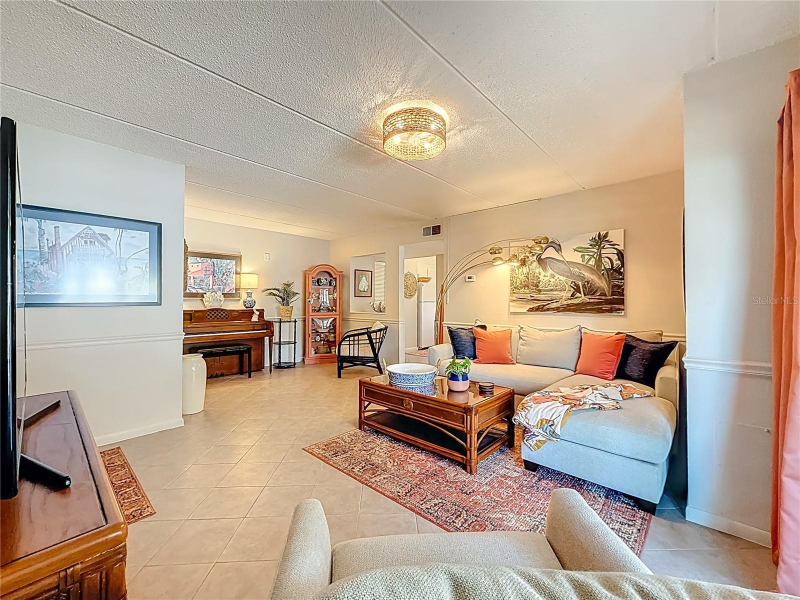 Living room looking from screened lanai