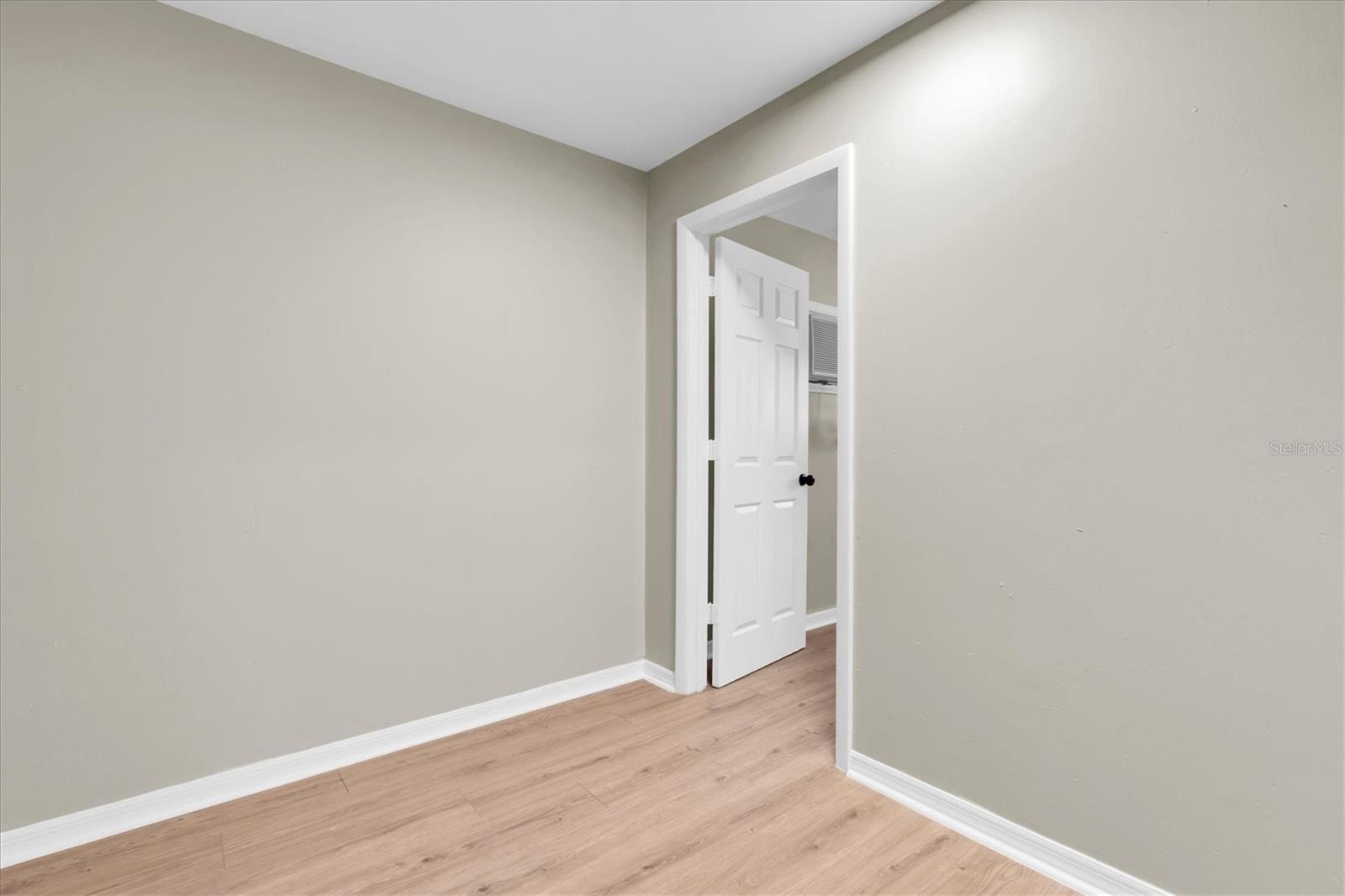 The door on the right in the bonus room leads to the Primary bedroom.