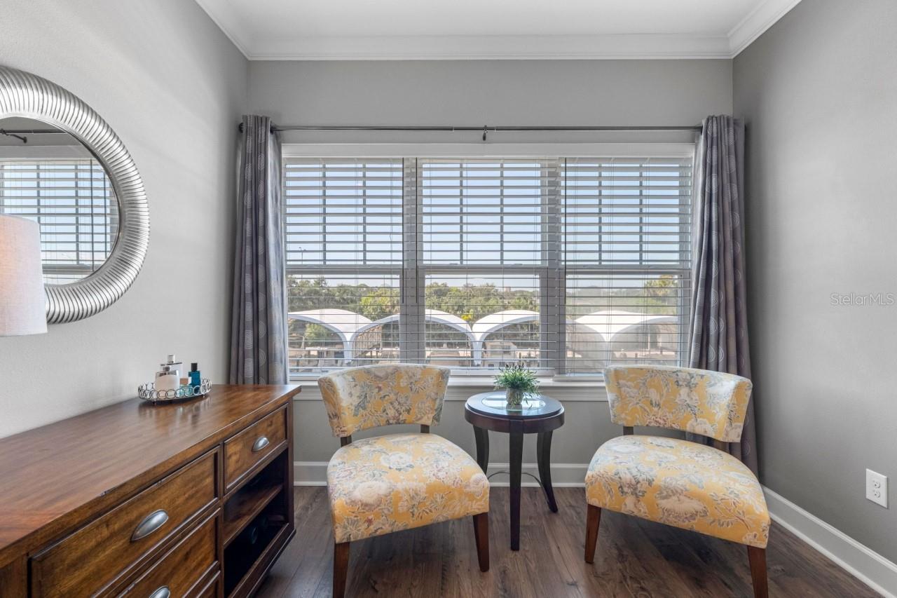 Primary Bedroom Nook with water views of possibly your own ?? boat
