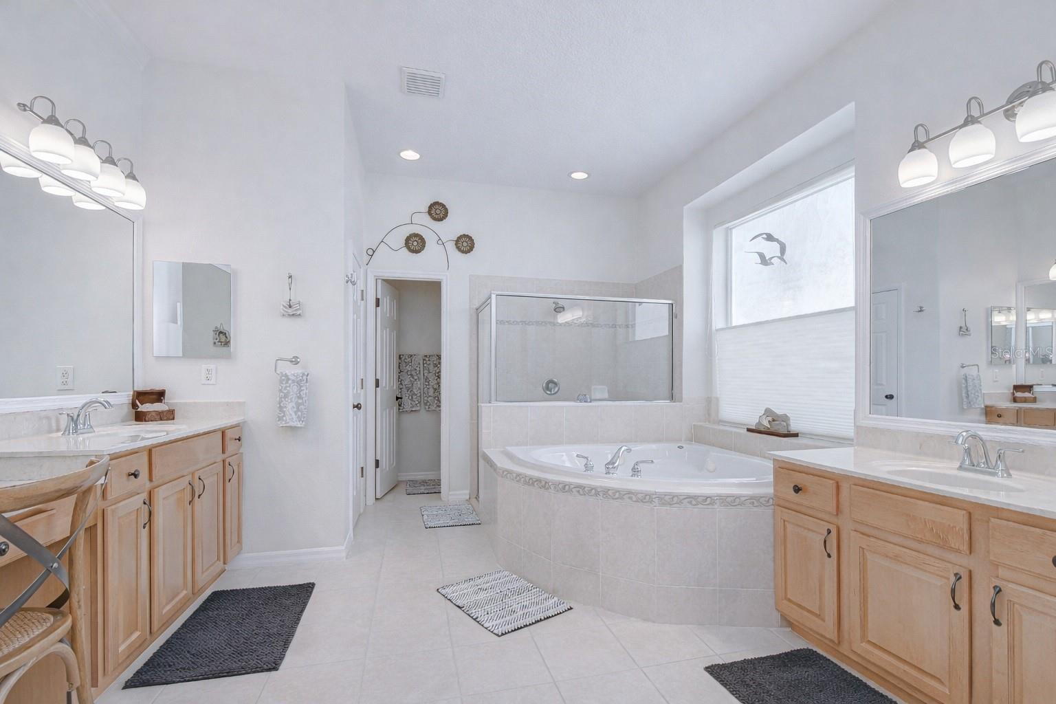 Spa-like en-suite with dual vanities.