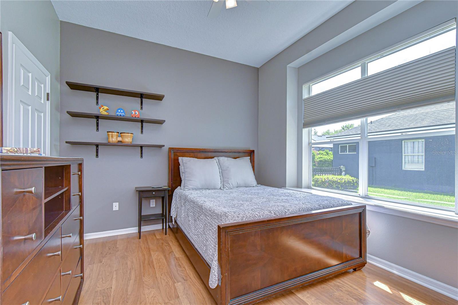 Secondary bedroom with natural light.