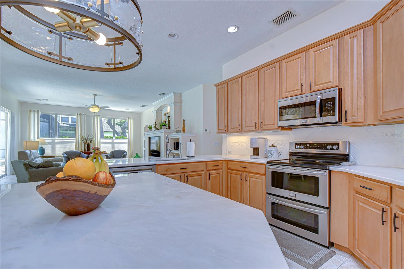 Light wood cabinets offering ample storage.