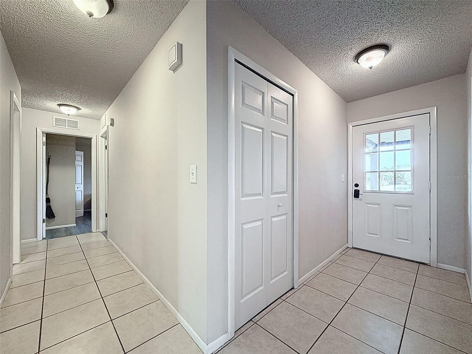 Pretty front entry with windowed door for light.