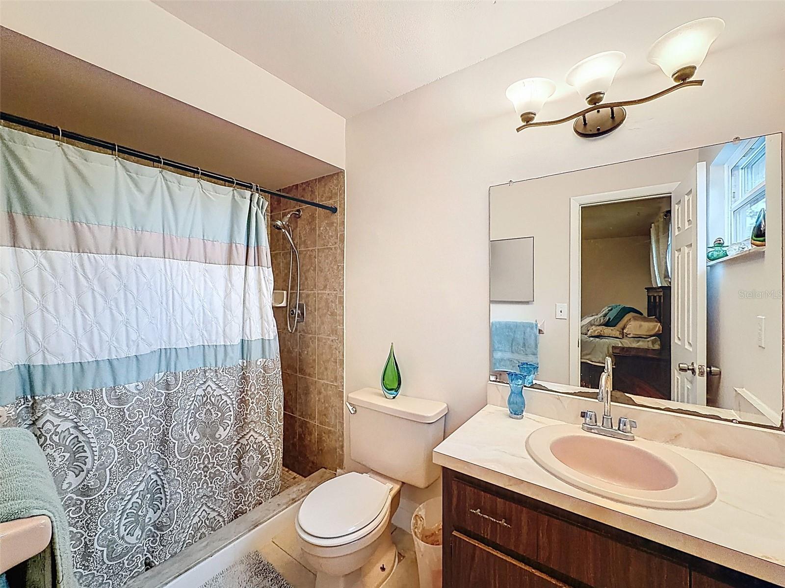 Master bedroom suite with en-suite bathroom AND large walk-in closet.