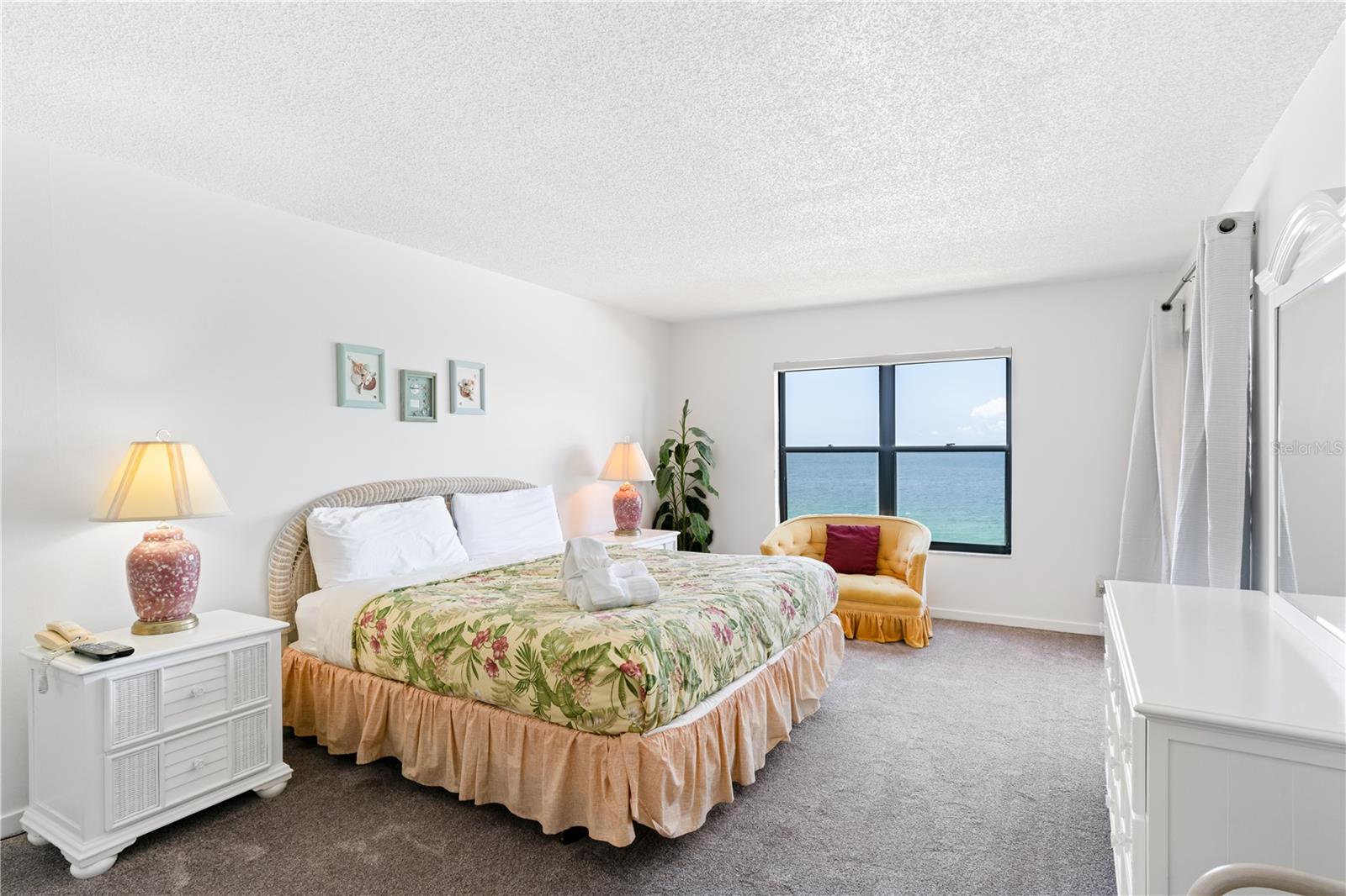 Primary Bedroom with waterview and sliders to the balcony