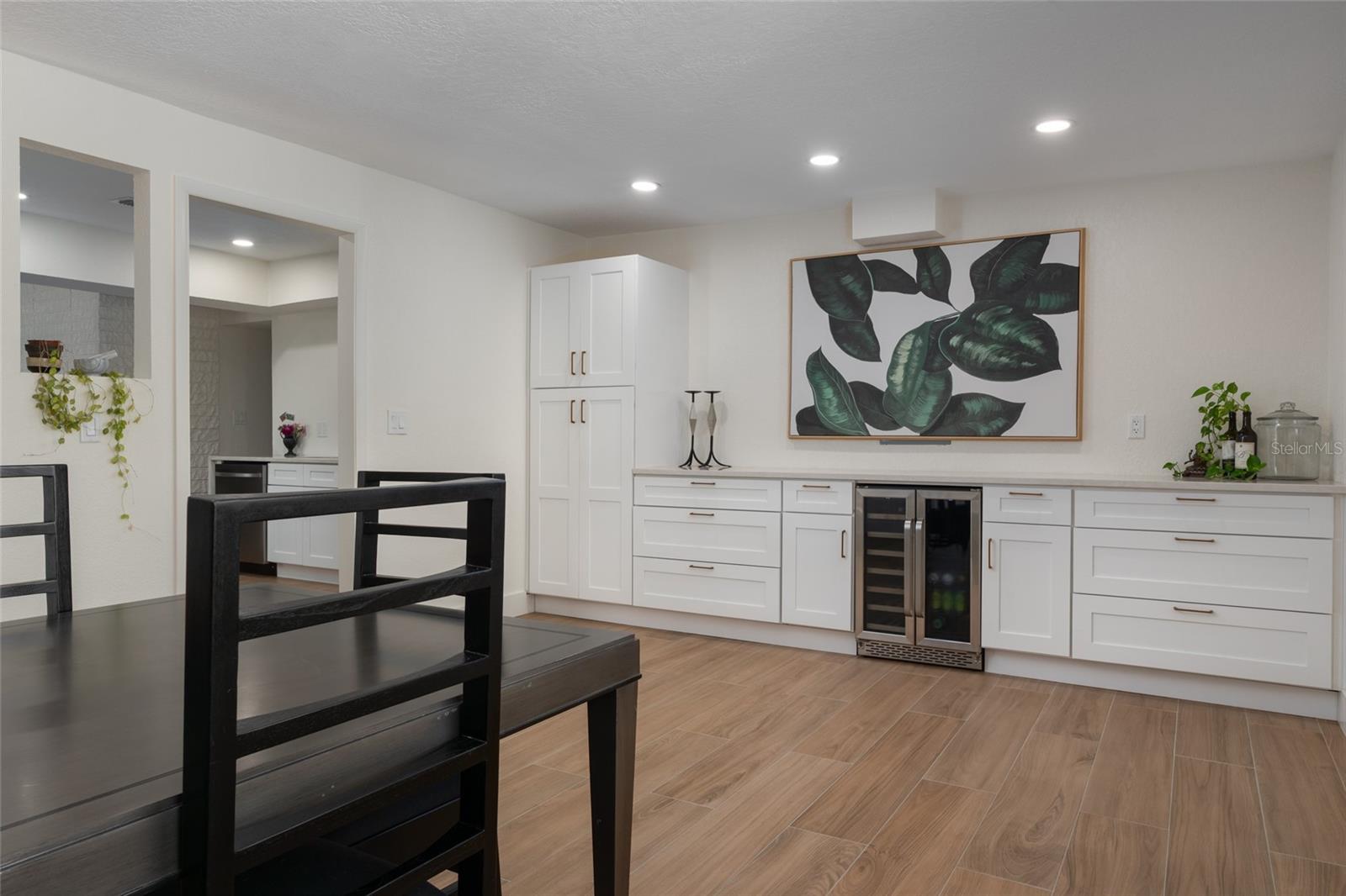 Dry bar with wine fridge + added cabinet space