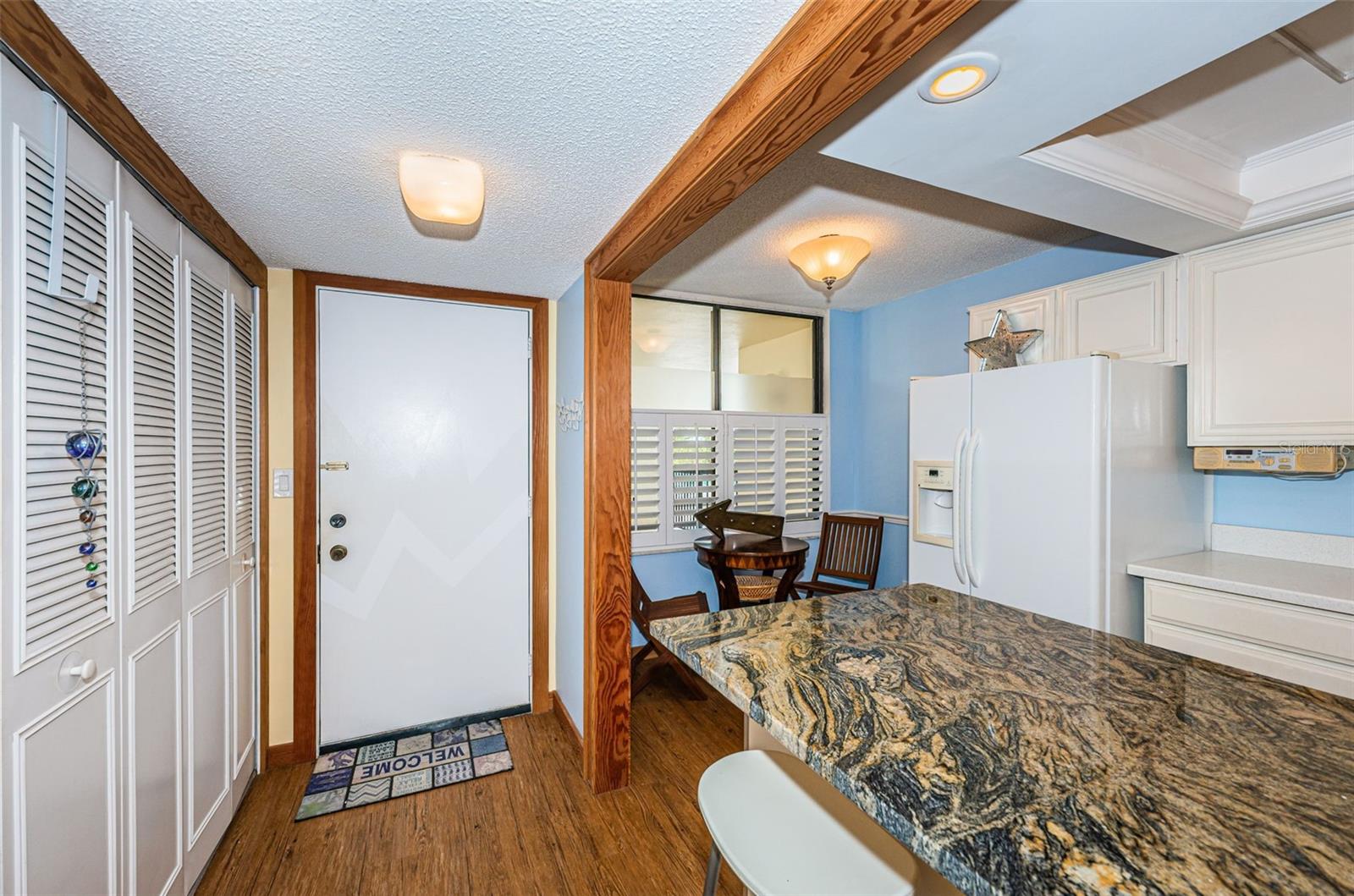 Foyer of the unit opening to the Kitchen