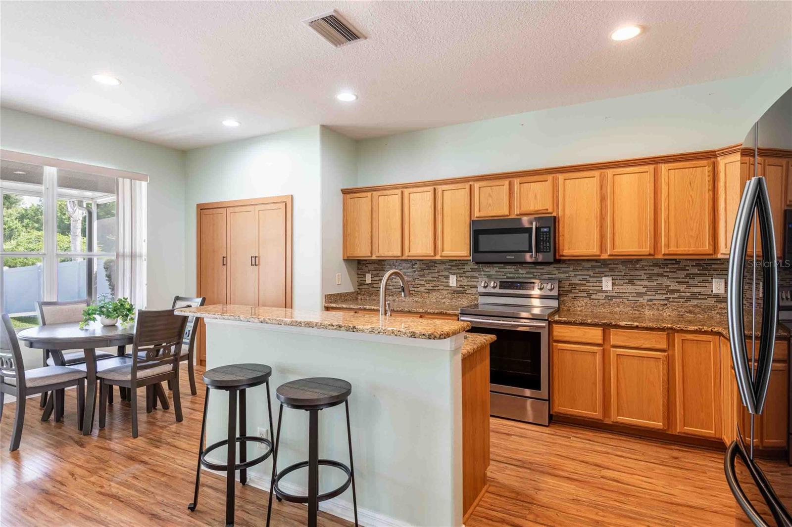 Large kitchen overlooking the lanai.