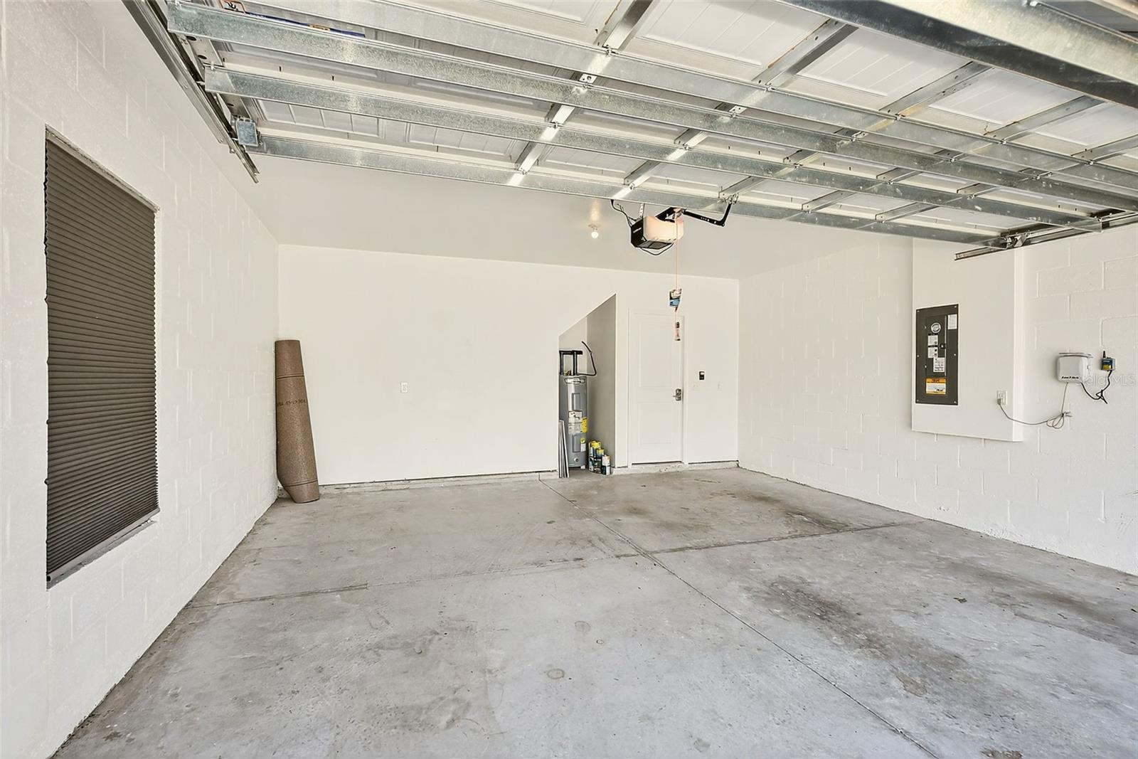 SPACIOUS 2 CAR  GARAGE WITH DOOR OPENER