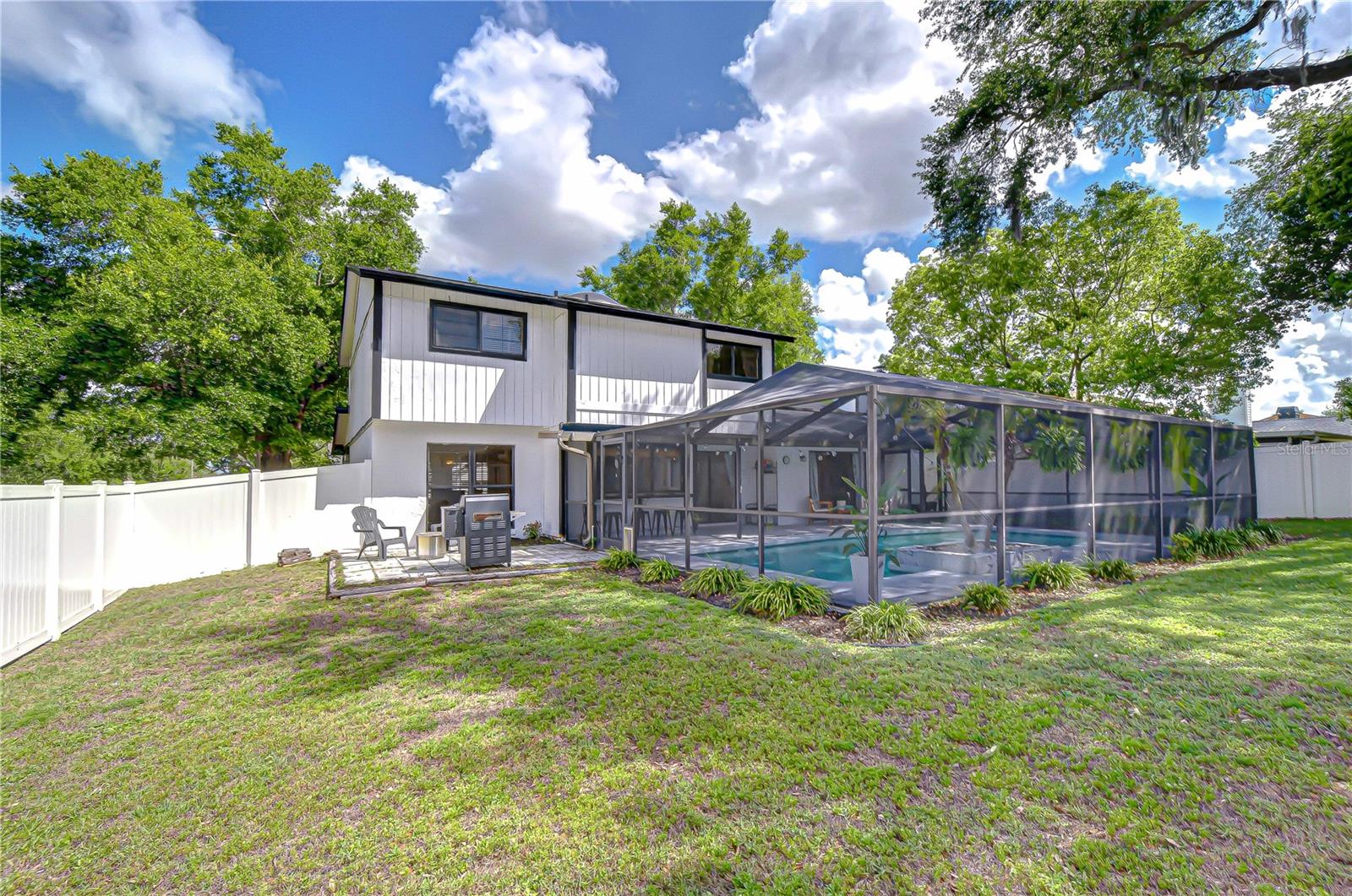 Beautifully updated pool home on a spacious corner lot.