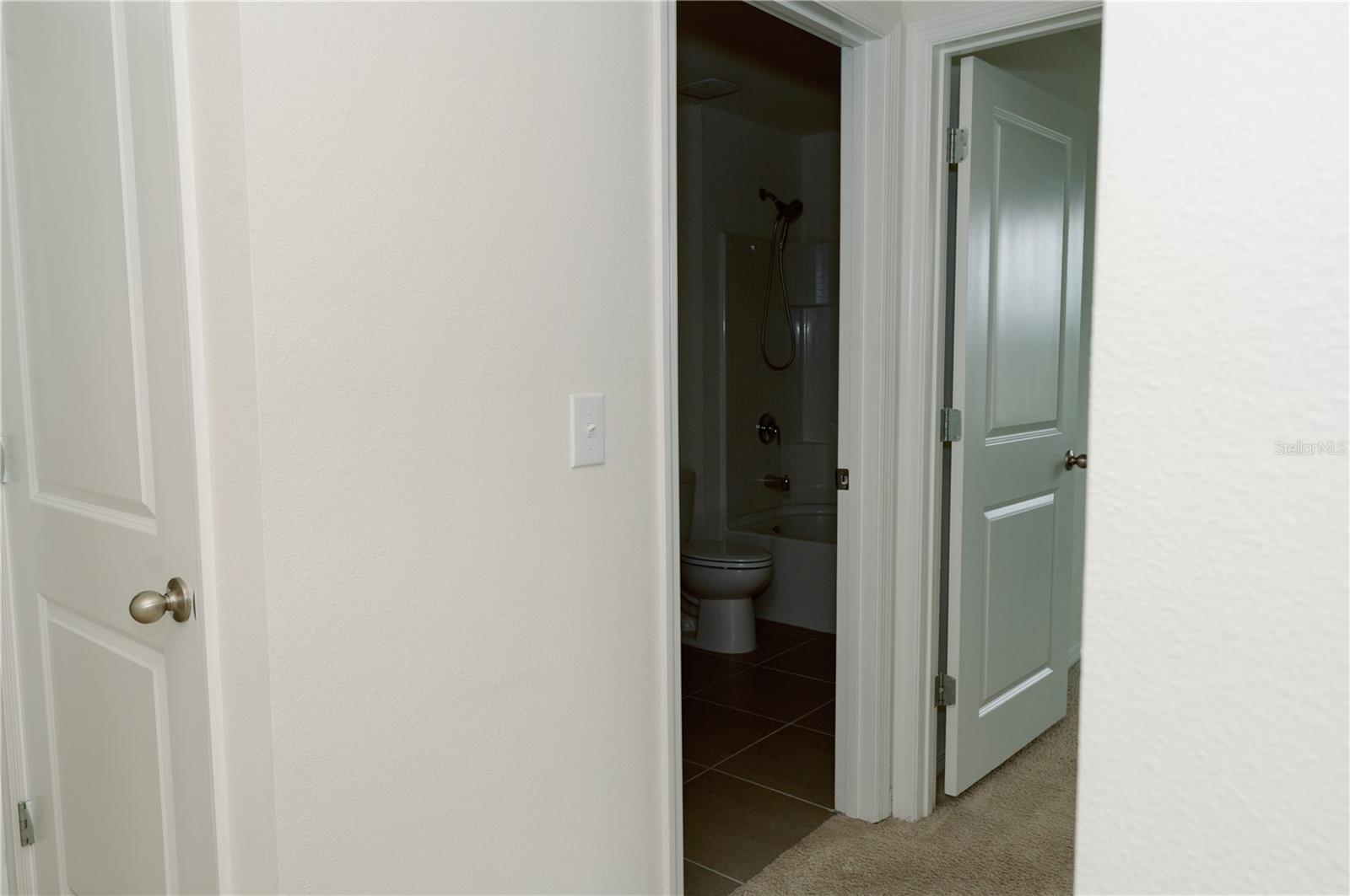 Bathroom 1 (2nd full bathroom with tub and shower combo)