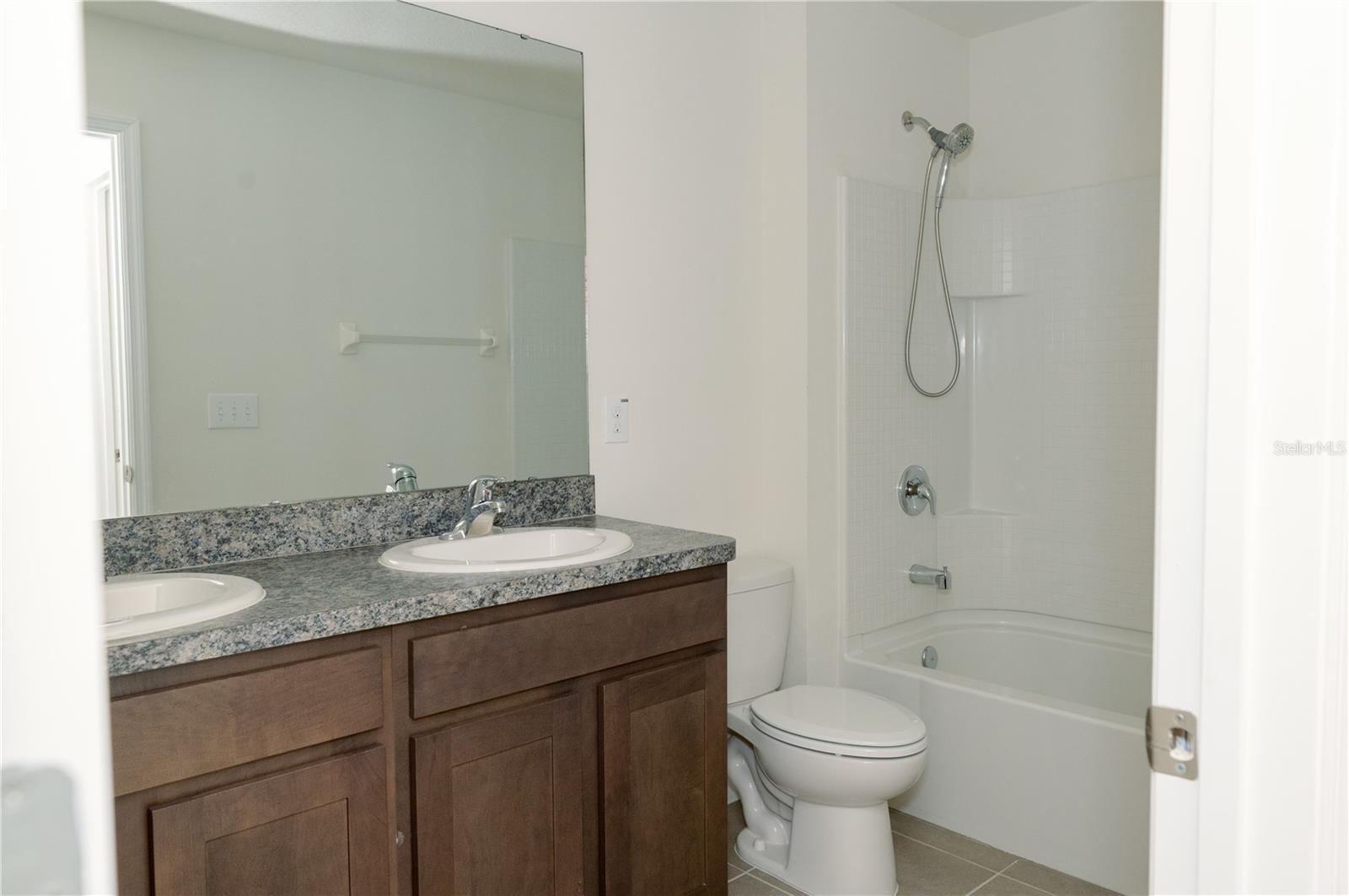 Bathroom 1 (2nd full bathroom) with double sink vanity