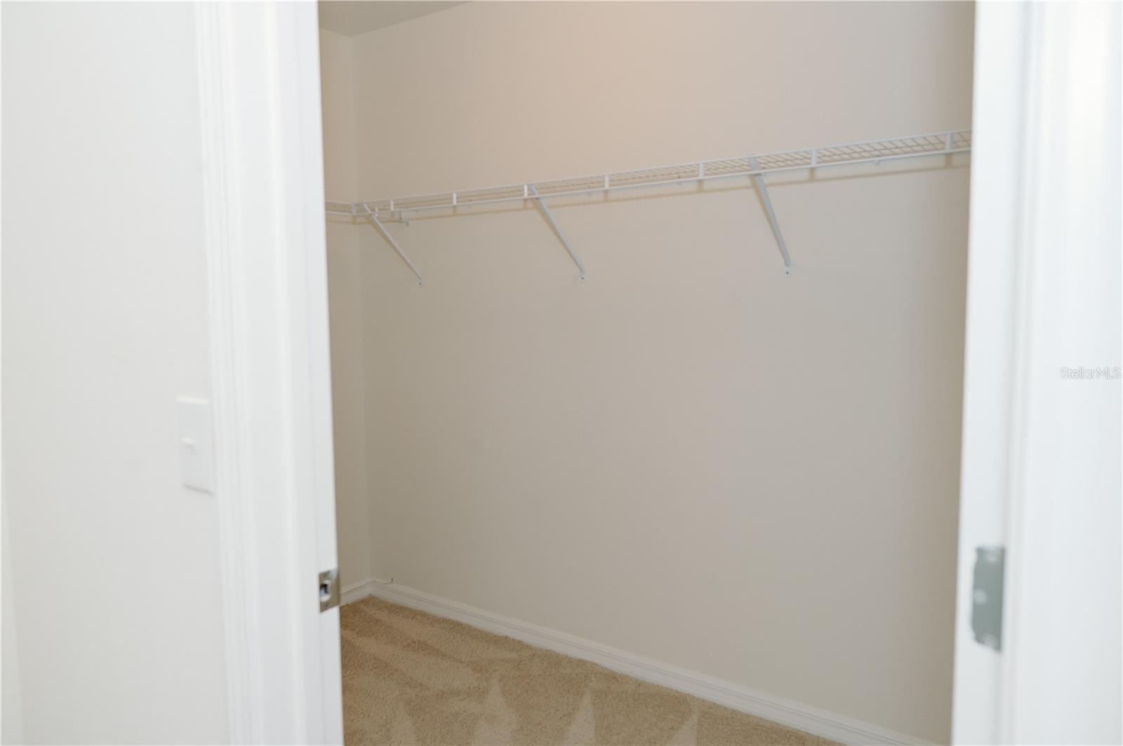 Primary walk-in closet