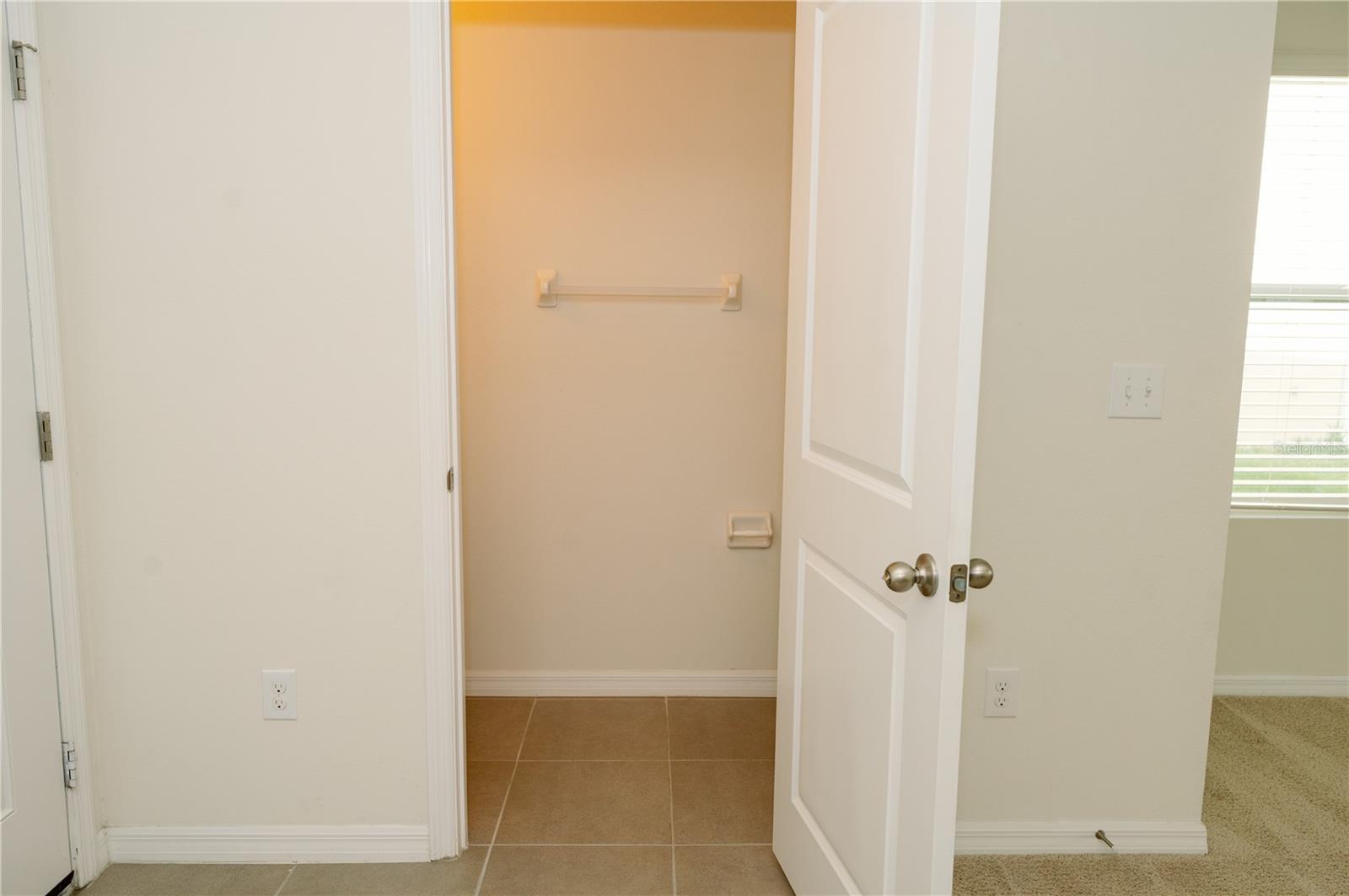 Half Bathroom, left of the front door
