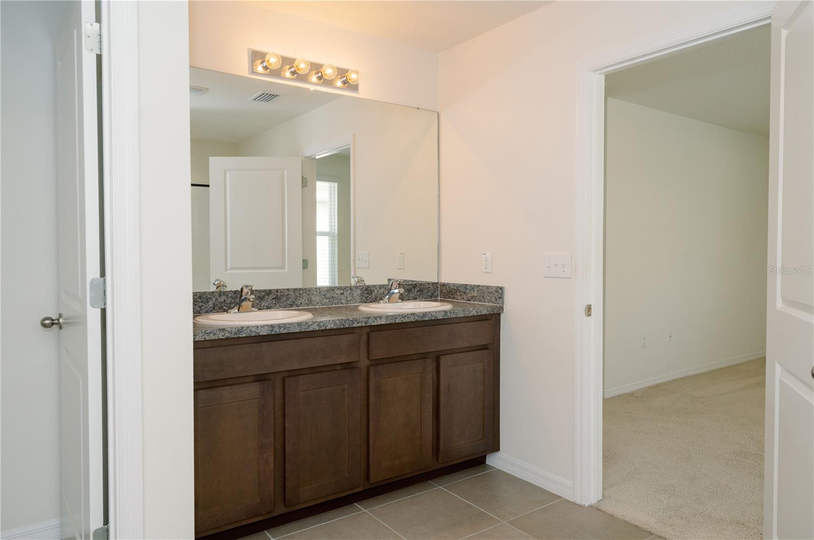 Primary bathroom double sink vanity