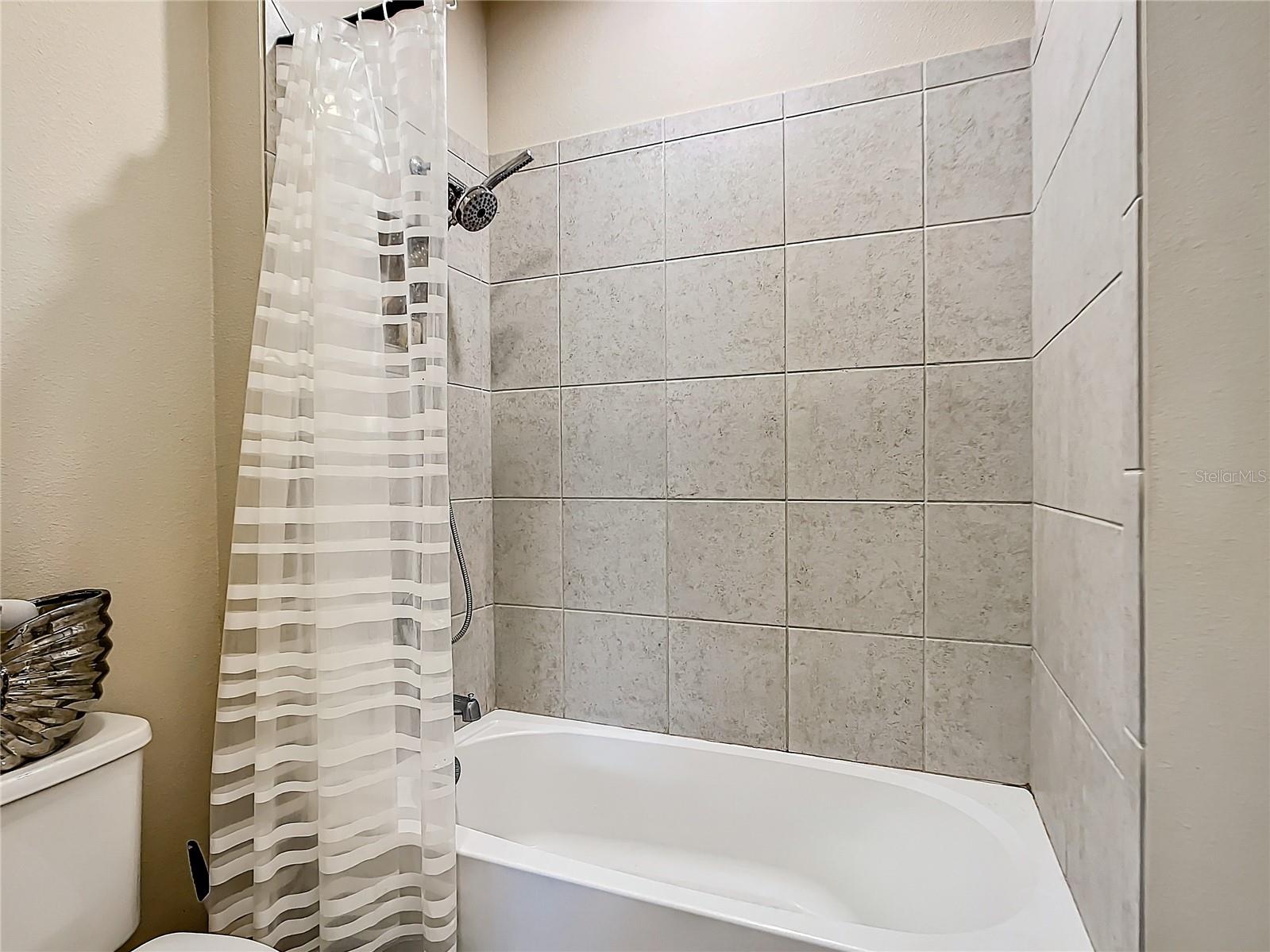 Hall bath separate room for toilet and bathtub