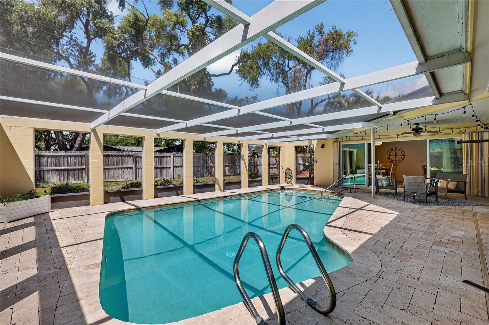 Large screened in saline and heated pool