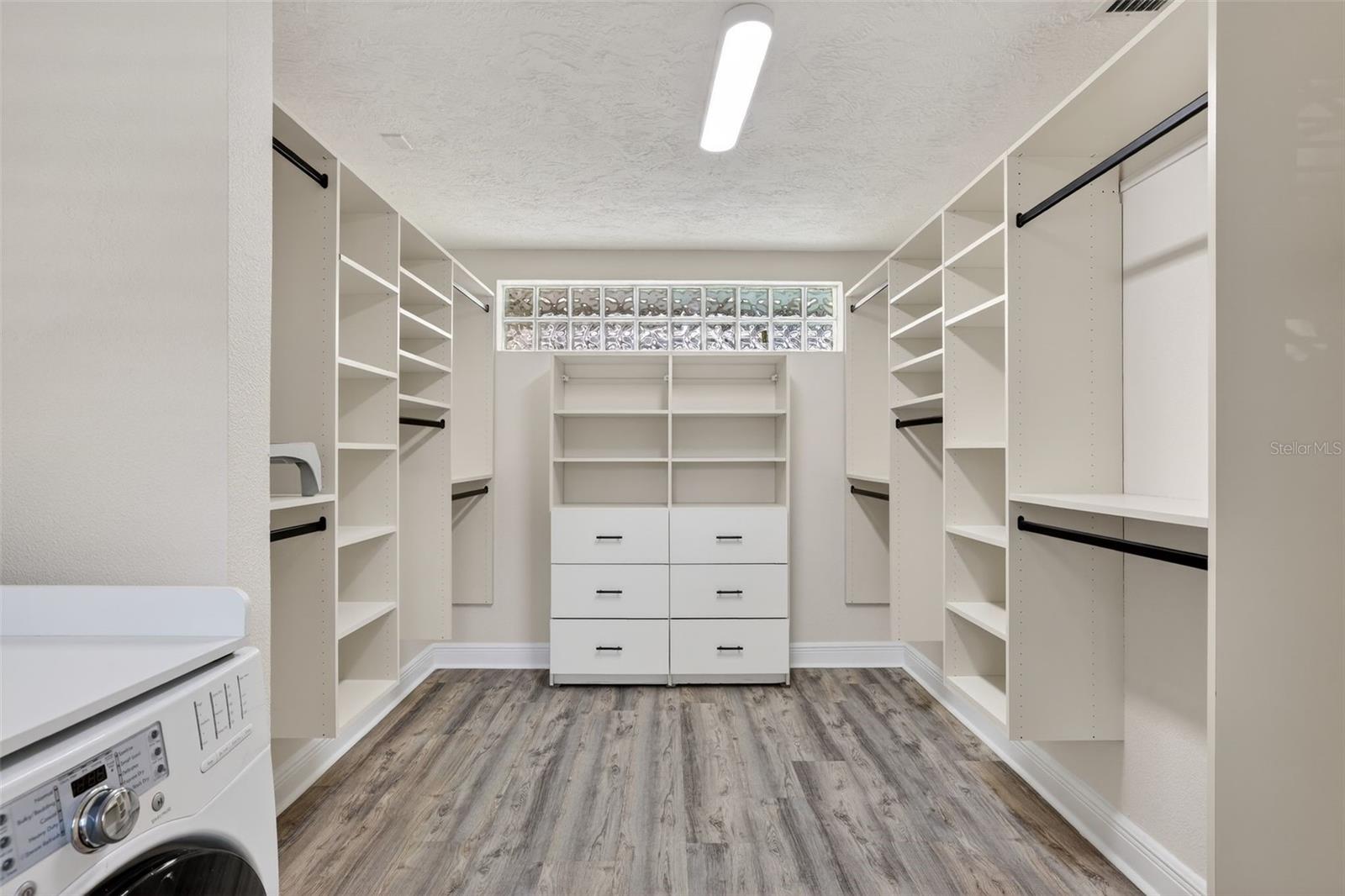 Primary bedroom walkin closet