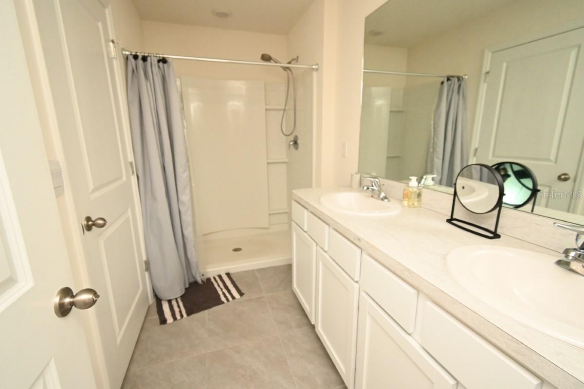 DUAL VANITY SHOWER STALL NO TUB