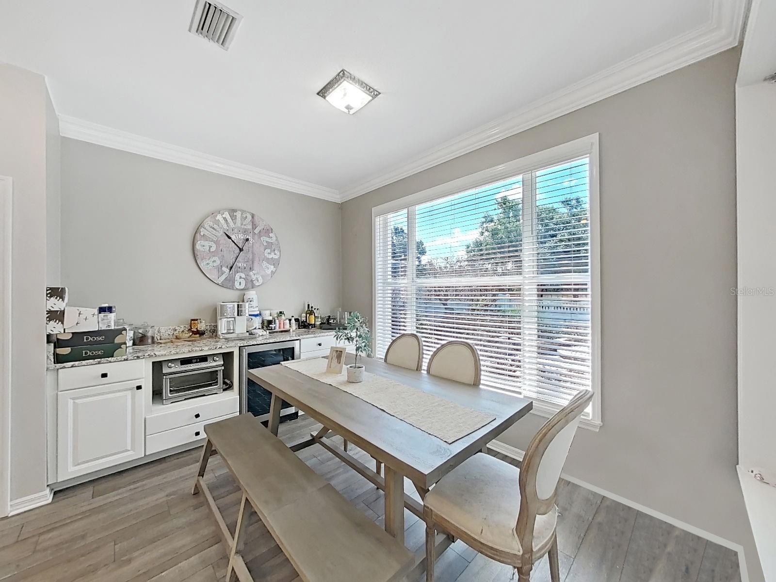 Breakfast with built-in shelving and drink cooler