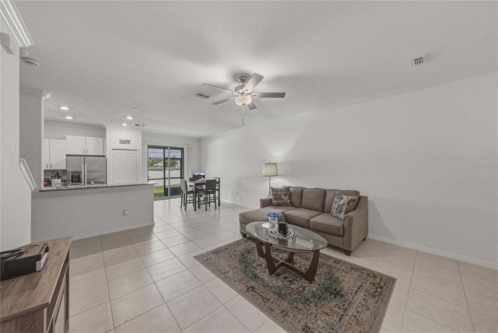 Living Room with Large Format Ceramic Tile and Ceiling Fan