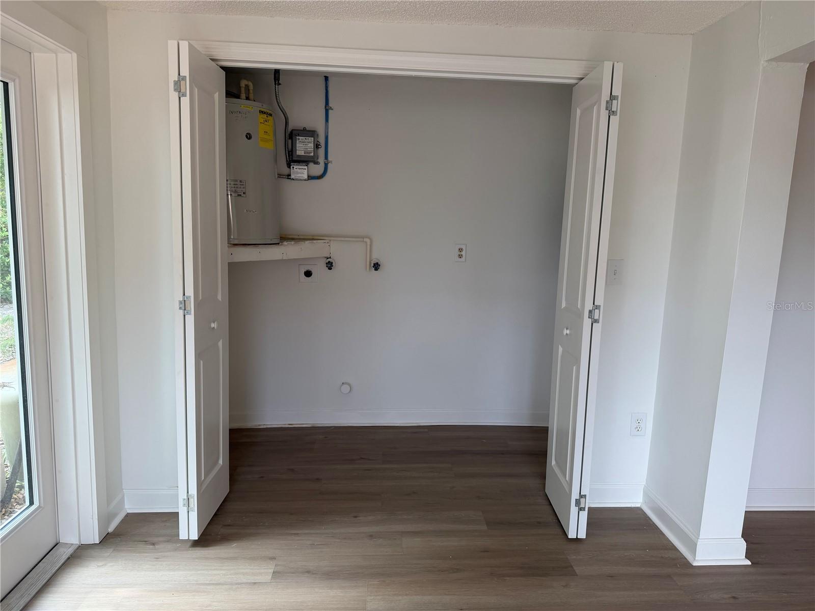 Laundry Closet and Electrical Panel/Hot Water Heater